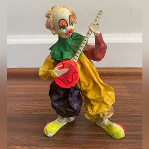 VINTAGE PAPIER MACHE 6.5" clown with instrument